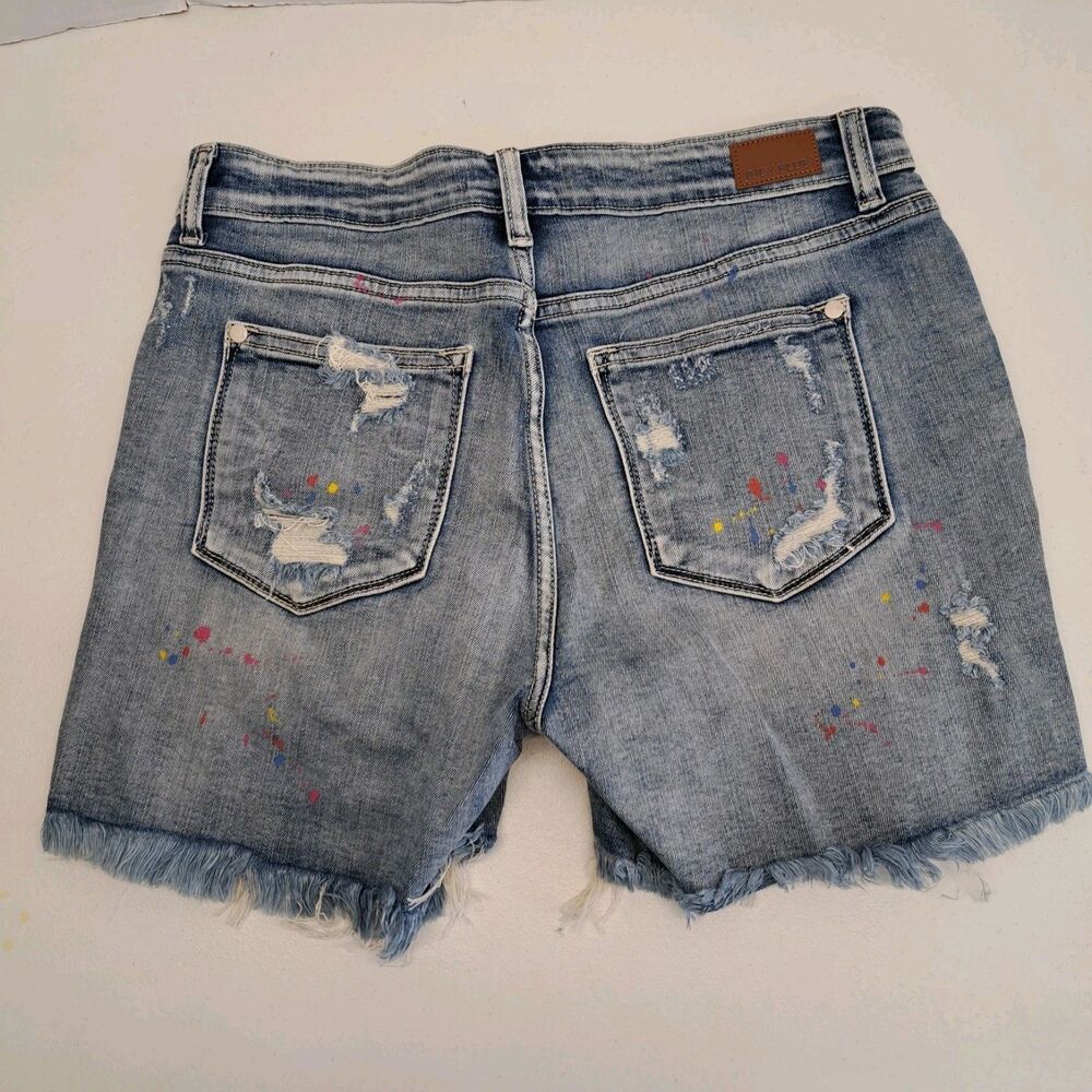 Judy Blue Women's Medium Mid Rise Rainbow Paint Splash Cutoff  Short - Picture 2 of 7